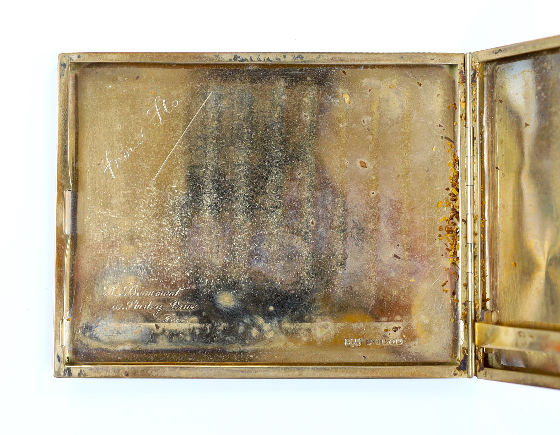 A George V engine turned 9ct gold cigarette case, Chester, 1925, 10.8cm, gross weight 132.7 grams.